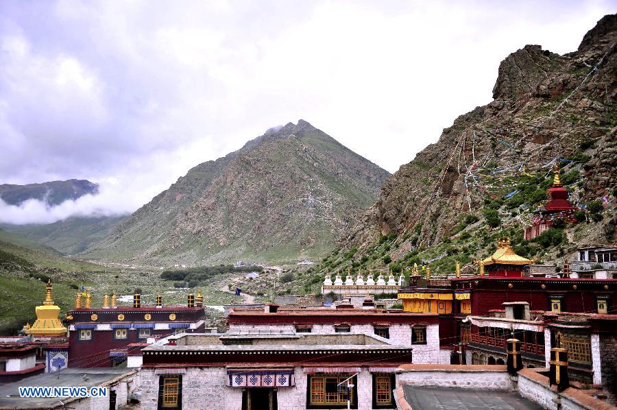 Photo taken on July 10, 2013 shows the Tsurpu Monastery in Doilungdeqen County, southwest China's Tibet Autonomous Region. Founded in 1189, Tsurpu serves as the traditional seat of the Karma Kagyupa, or "White Hat Sect," of Tibetan Buddhism. (Xinhua/Liu Kun)