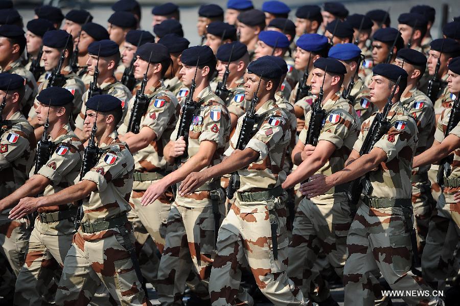French soldiers inoled in the Malian mission attend the Bastille Day military parade in Paris, France, on July 14, 2013. (Xinhua/Etienne Laurent)