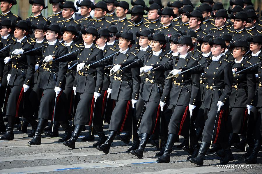 Members of Ecole polytechnique attend the Bastille Day military parade in Paris, France, on July 14, 2013. (Xinhua/Etienne Laurent) 