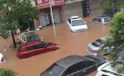 Continuous heavy rain floods downtown Kunming