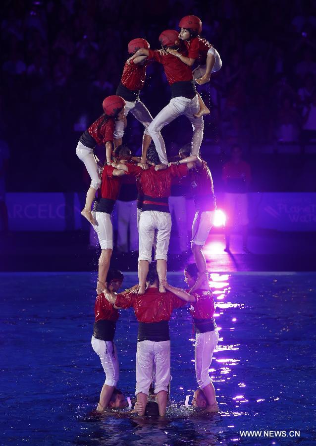 A castell is built during the Opening Ceremony of the 15th FINA World Championships at Palau Sant Jordi in Barcelona, Spain on July 19, 2013. (Xinhua/Wang Lili)