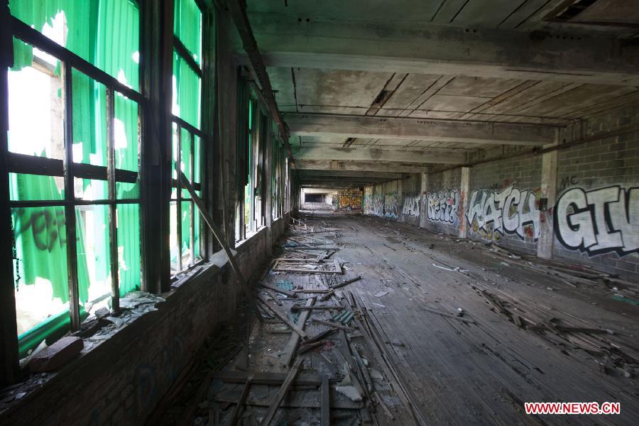 Photo taken on July 19, 2013 shows the Packard Plant, an abandoned auto factory, in Detroit, midwest city of the United States. U.S. city Detroit filed for bankruptcy Thursday, making it the largest-ever municipal bankruptcy in U.S. history, local media reported. (Xinhua/Marcus DiPaola)