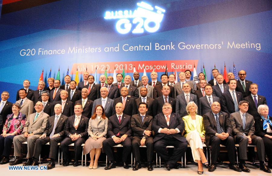 Representatives of the Group of Twenty (G20) finance ministers and central bank governors' meetings pose for group photos in Moscow, Russia, July 20, 2013. The G20 finance ministers and central bank governors' meetings kicked off in Moscow on Friday. (Xinhua/Ding Yuan)