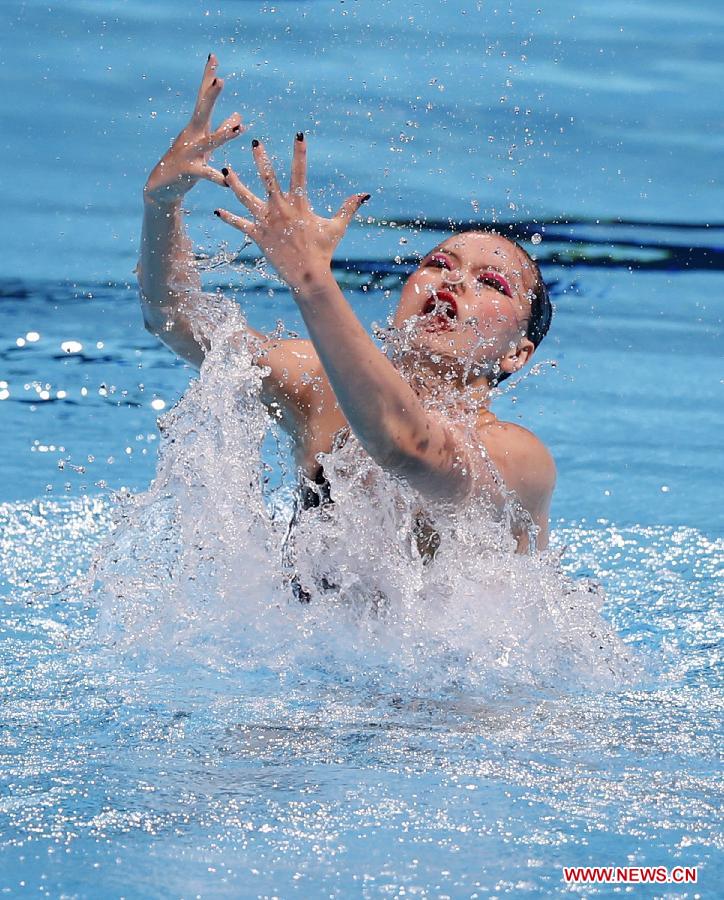Huang Xuechen of China competes in the Solo Preliminaries of the Synchronised Swimming competition in the 15th FINA World Championships at Palau Sant Jordi in Barcelona, Spain, on July 22, 2013. Huang advanced to the final with a total score of 95.280 points.(Xinhua/Wang Lili) 