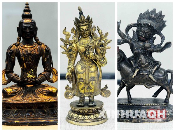Photo shows three Buddhist statues displayed at a Tibetan Buddhism art exhibition in the Heilongjiang Provincial Museum in Harbin, capital of northeast China's Heilongjiang Province, July 24, 2013. Titled "Tibetan Buddhism art in Qinghai", the exhibition shows 120 representative artworks from the Qinghai Provincial Museum, fully reflecting the charm of Tibetan Buddhism art. [Photo/Xinhua]
