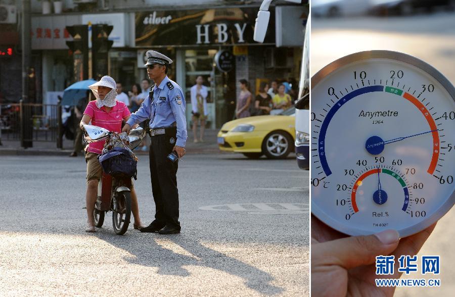 Traffic policeman Chen Naiqian directs traffic under summer sun in Hangzhou at 5:35 pm on July 23. Thermometer showed the temperature was over 42 degree Celsius at that time. (Xinhua/ Ju Huanzong)