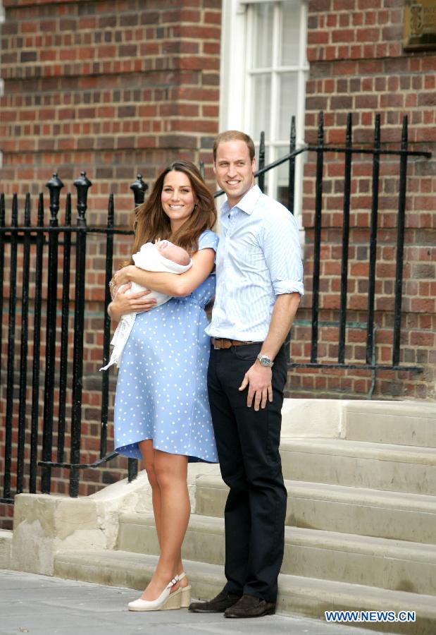 Prince William and his wife Catherine, Duchess of Cambridge, meet the public with their baby outside the Lindo Wing of St Mary's Hospital, in central London, July 23, 2013. Britain's Duchess of Cambridge Kate gave birth to a boy Monday afternoon. (Xinhua/Bimal Gautam)