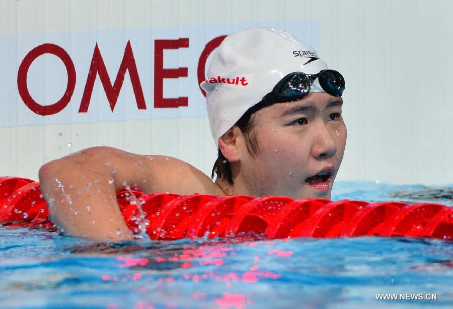 China's Ye Shiwen reacts after competing in the heats of the women's 200m individual medley swimming event on day 9 of the FINA World Championships at Palau Sant Jordi in Barcelona on July 28, 2013. (Xinhua/Guo Yong) 