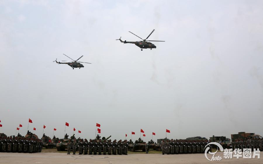 China on Saturday began to send military personnel and armaments to Russia, where they will join 20-day joint anti-terrorism drills held by both parties. (Photo source: xinhuanet.com)