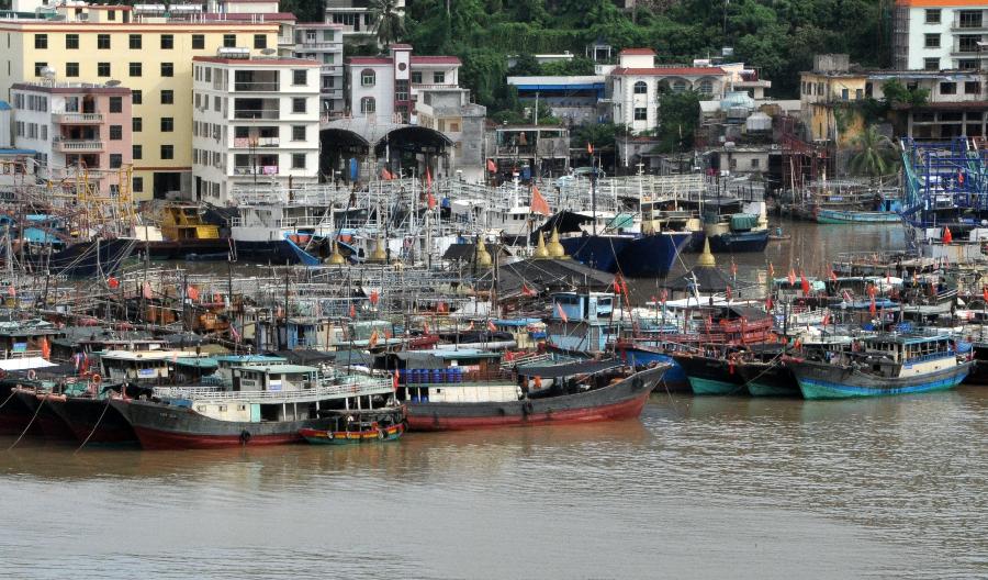Photo taken on July 29, 2013 shows fishing boats at the port of Sanya, south China's Hainan Province. As the two-and-half-month summer fishing moratorium is going to end on Aug. 1, fishermen prepared to resume fishing in Hainan. (Xinhua/Wang Junfeng)