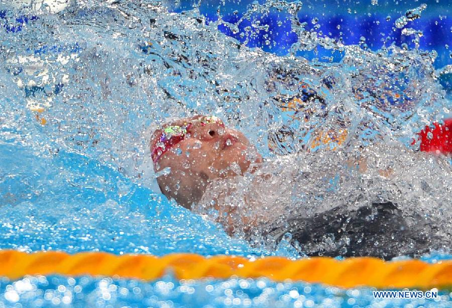 Zhao Jing of China competes during the women's 50m backstroke heats of the swimming competition at the 15th FINA World Championships in Barcelona, Spain on July 31, 2013. (Xinhua/Guo Yong)
