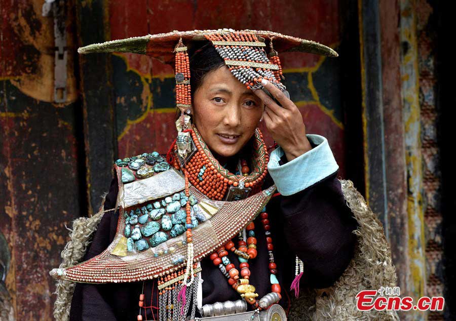 A Tibetan woman in traditional 'peacock costume' in a village of Burang County, Ngari Prefecture. (CNS/Li Lin)