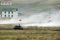 Chinese armored forces advance in Peace Mission-2013 