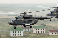 Helicopters, tanks seen during China-Russia joint drill