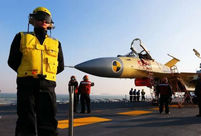 Roar of J-15 fighter is melody for operator on the Liaoning