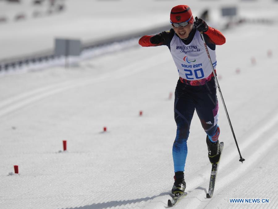 Players compete during 20km standing of Cross Country at 2014 Paralympic Games