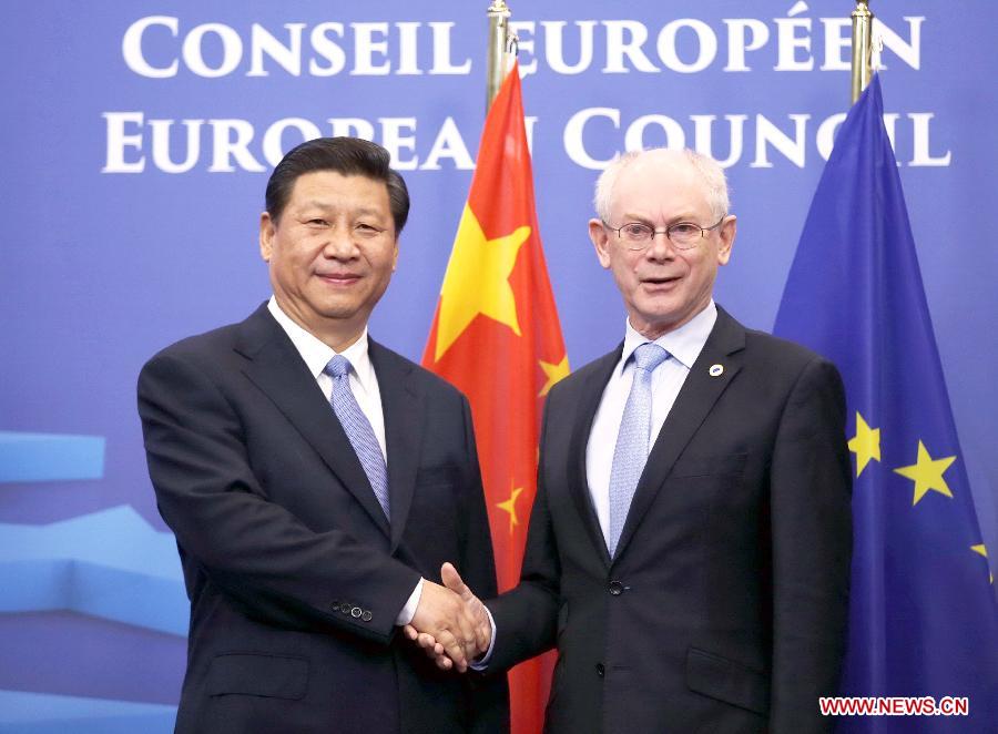 Visiting Chinese President Xi Jinping (L) shakes hands with European Council President Herman Van Rompuy during their talks in Brussels, Belgium, on March 31, 2014. (Xinhua/Ju Peng) 