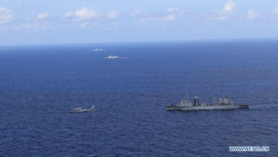 Chinese escort naval fleet reaches target area to search for MH370
