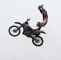 Motorcycle stunt on the Bund