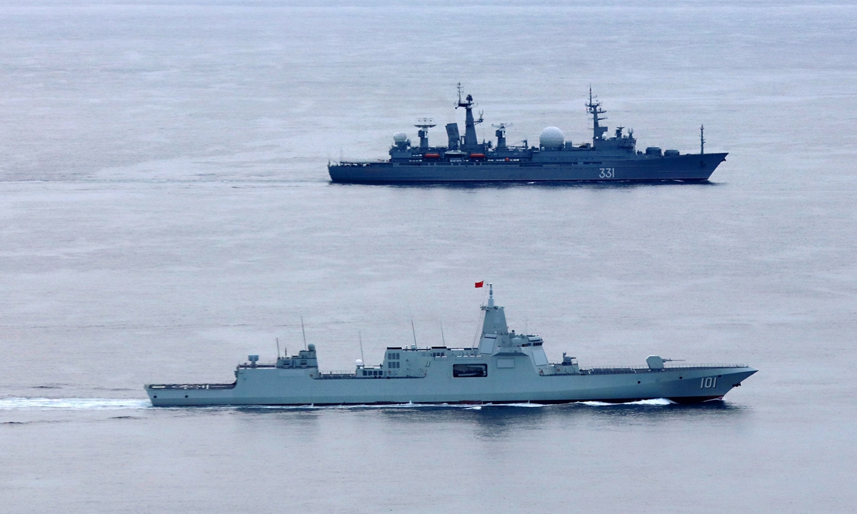 China’s guided-missile destroyer Nanchang sails alongside Russia’s command ship Marshal Krylov in the West Pacific on October 19, 2021. Photo: Li Tang 