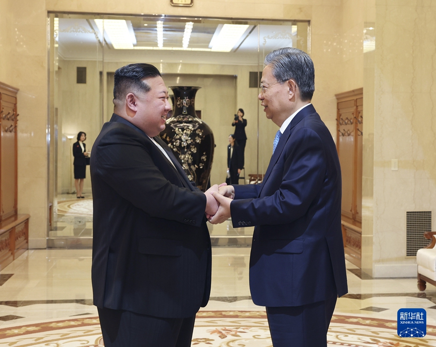 Zhao Leji, a member of the Standing Committee of the Political Bureau of the Communist Party of China (CPC) Central Committee and chairman of China's National People's Congress Standing Committee, shakes hands with Kim Jong-un, general secretary of the Workers' Party of Korea and president of the State Affairs of the Democratic People's Republic of Korea (DPRK), in Pyongyang, the DPRK on April 13, 2024.